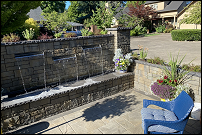 Outdoor seating wall and chair