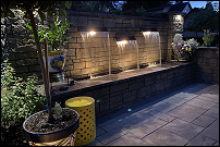 Outdoor seating wall at evening time