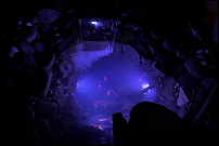 Blue light water feature at night