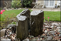 Water feature surrounded by flowers in Eugene, Oregon